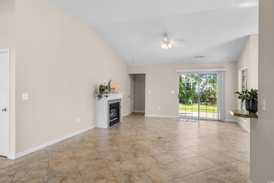 Unfurnished living room with lofted ceiling and ce