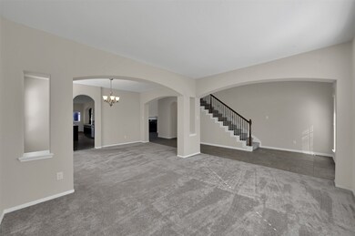 Formal living- Carpet was placed on top of the til