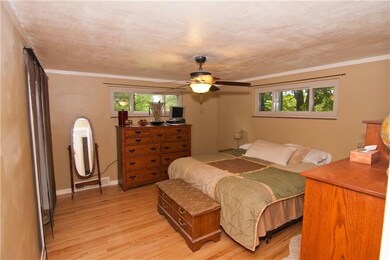 The 14x13 master bedroom features more stunning ha