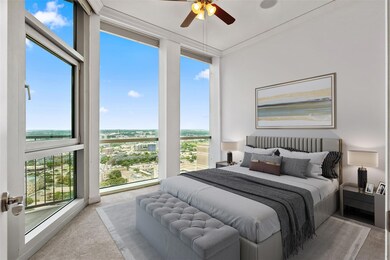 Carpeted bedroom with ornamental molding and ceili