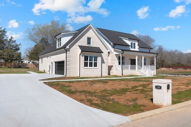 109 Settlers Drive in Tullahoma
Large front porch, screened porch and large patio