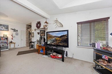 Living area featuring carpet floors