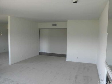 Large Living Room with fire place, balcony and gol