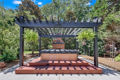 Hot Tub with outdoor fireplace
