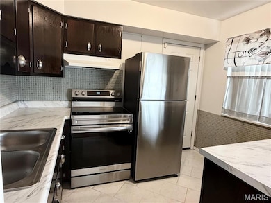 7594 Hazelcrest Dr unit B, Hazelwood, MO 63042 - photo 2