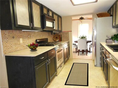 This view of the kitchen looks through to the brea