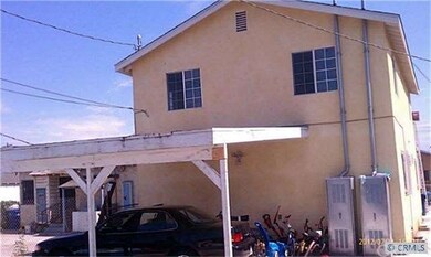 BACK OF  BUILDING CAR PORT