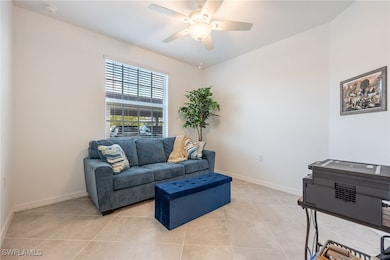 Den/Additional room featuring light tile patterned