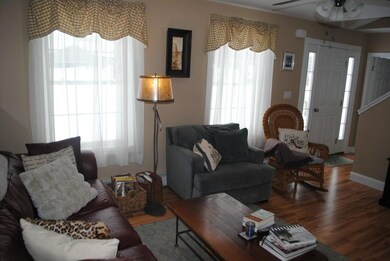 Warm, cozy Living room with hardwood...