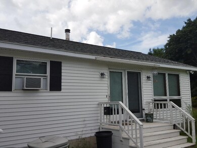 Apartment addition on rear of single...