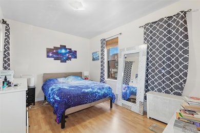 Bedroom featuring light wood-type flooring