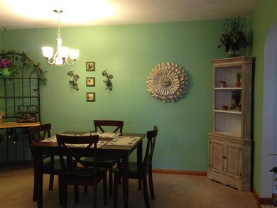 Casual dining and Living room combo.  Hardwood und