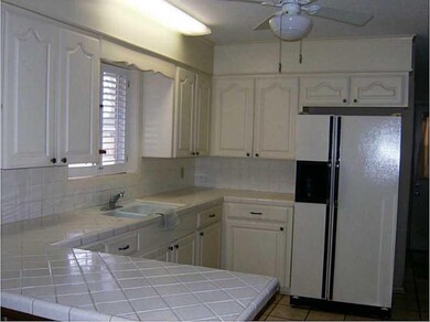 Kitchen. Kitchen has updated cabinets.