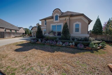 Stunning landscaping surrounding the home provides amazing curb appeal. 