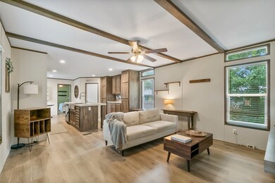 The family room flows seamlessly into the open concept kitchen.
