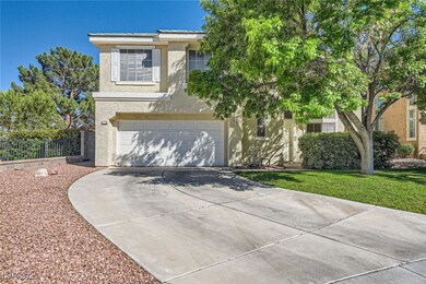 View of front of home with stucco siding, concrete