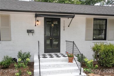 Front porch with painted diamond pattern