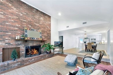 Living Room with brick fireplace