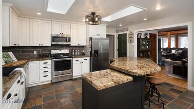 Updated, bright kitchen opens up to dining room