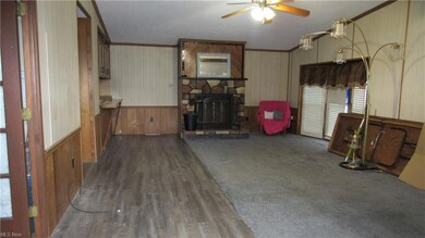 25x15 living room with fireplace, new vinyl floori
