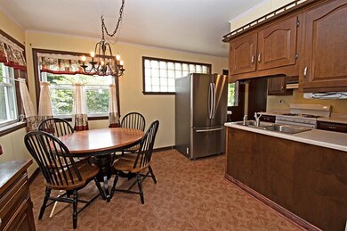 Updated dine-in kitchen with wrap around windows f