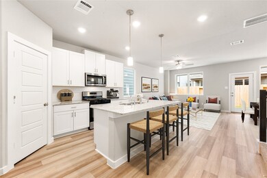 Bright and spacious open-concept kitchen and livin