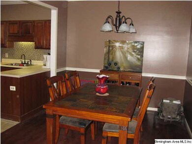 Formal dining room opens to kitchen feautres inclu