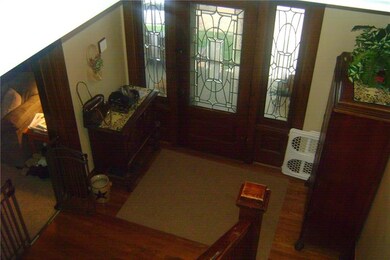 12 X 9 FOYER WITH HARDWOOD FLOORS.