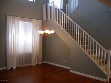 Front living/dining rm with open stairs