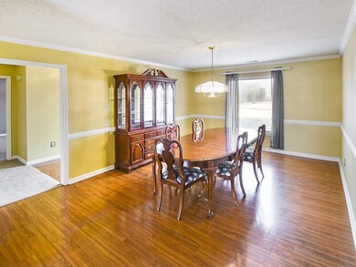 Dining room open to the kitchen and great room.