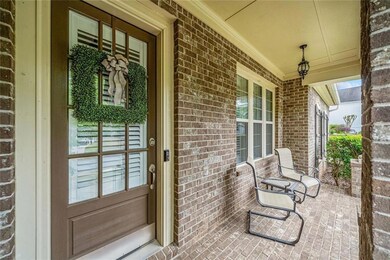 Gorgeous brick covered front porch
