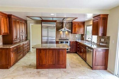 This is one amazing kitchen!  Granite counters, Tr