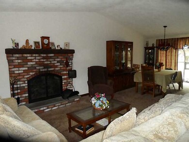 Living Room. Cathedral ceiling and fireplace