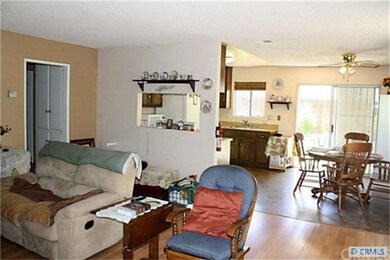 Open floor plan combines the kitchen and dining wi