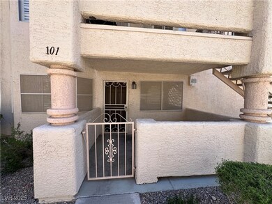 Doorway to property featuring stucco siding