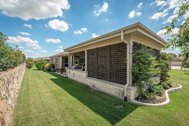Gorgeous quality extended covered patio that provi