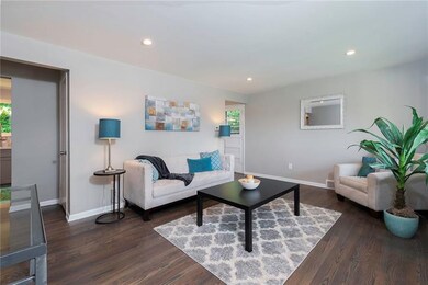 Living Room with Refinished Hardwood Flooring, Rec