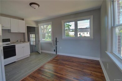 Dining/Sitting Room is Open to Kitchen and has Washer/Dryer Hook-ups!