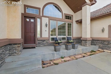 The covered front porch is welcoming and spacious.