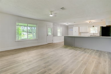 This family room seamlessly flows from the kitchen