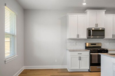 Bright dine-in kitchen with plenty of space for ca