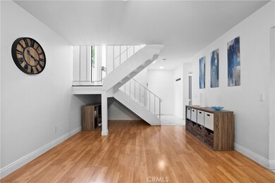 Part of Spacious Living Room near the front entry and the kitchen.  Could be used as a dining area.