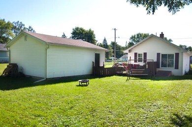Exterior back of house and garage.