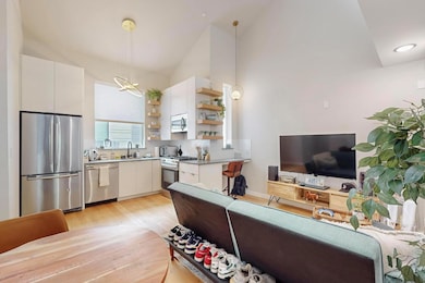 Kitchen featuring appliances with stainless steel