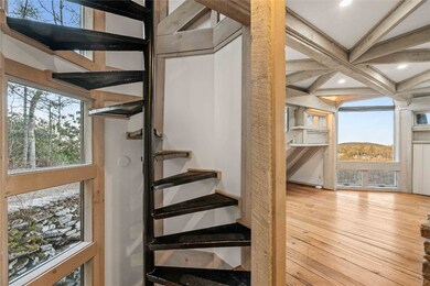 Foyer with spiral stairs