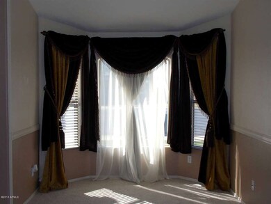 FORMAL LIVING ROOM WITH BAY WINDOW