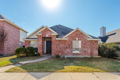 View of front of house with a front yard