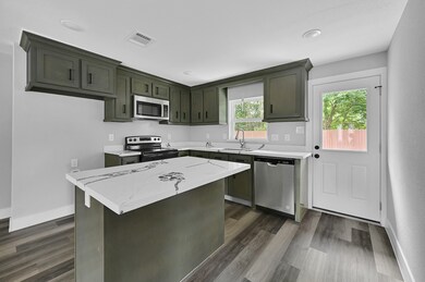 quartz counter top in kitchen and bathrooms