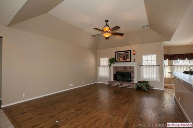 Great room offering up graded hand scraped hard wo