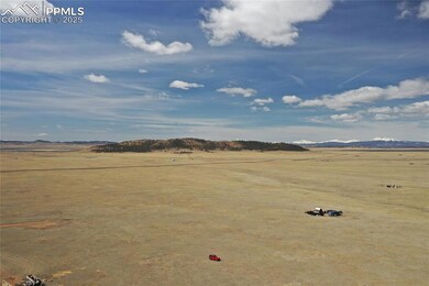 Birds eye view of property featuring a mountain vi
